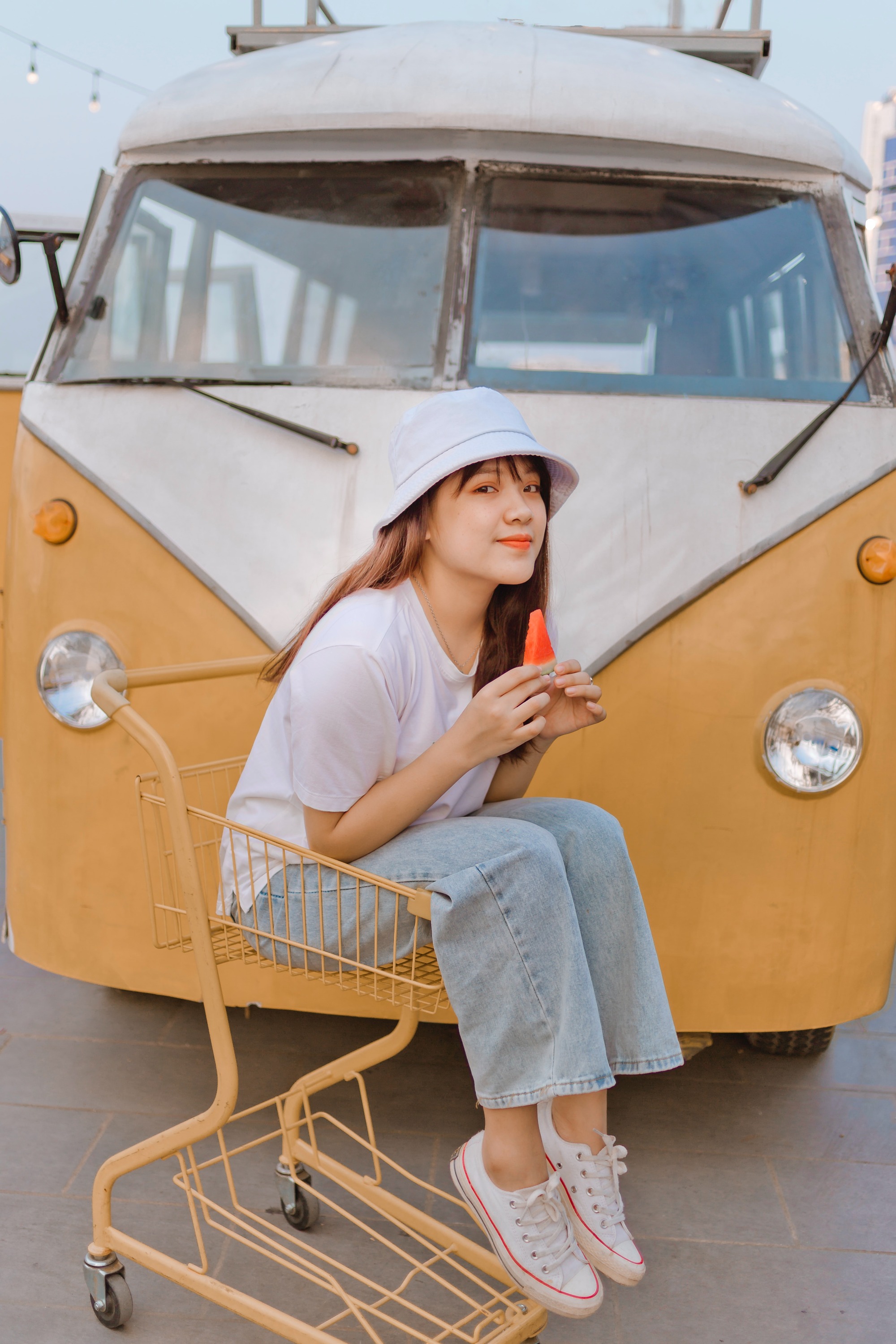 Girl besides a car